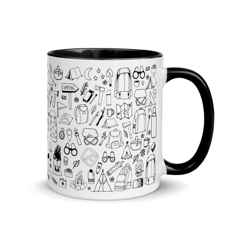 a coffee mug sitting next to a coffee cup 
