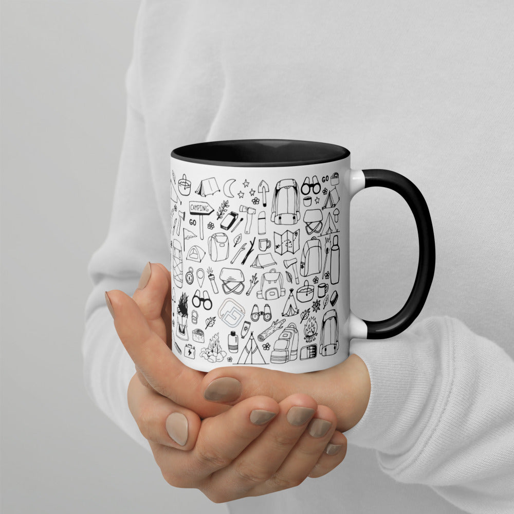 a person holding a coffee mug in front of a coffee cup 